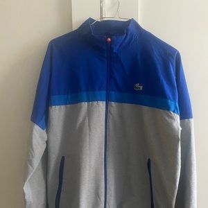 I am selling a medium size Lacoste sweater for men.